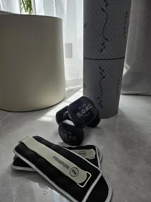 a pair of dumbbells sitting on top of a table at Paganini 3bd Apartment in Nice