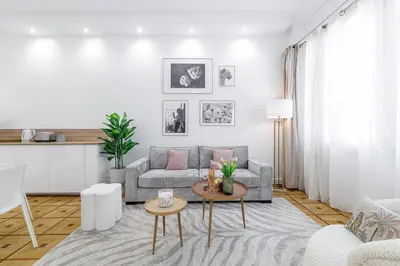 a living room with a couch and a table at Capitol Close To The Beach - Happy Rentals in Nice