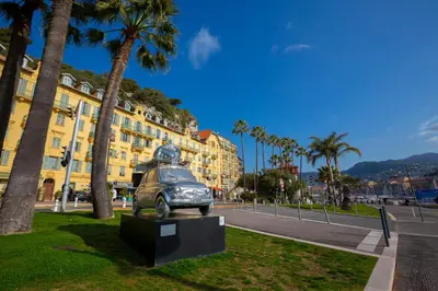 a statue of a person riding a car on a street at Capitol Close To The Beach - Happy Rentals in Nice