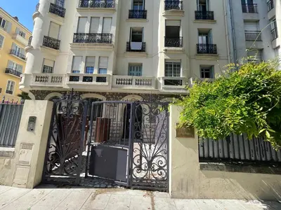 a building with a gate in front of it at Studio Carabacel in Nice