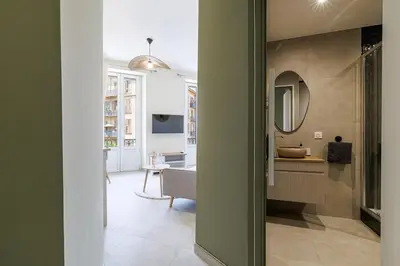 a bathroom with a sink and a mirror at T2 situé au centre-ville de Nice in Nice