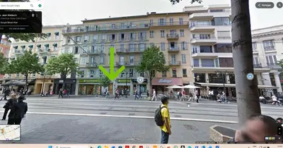 a street in a city with a green x at Central- walk to Massena & Beach in Nice