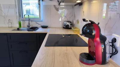 a kitchen with a appliance sitting on a counter at Studio La Madrague Côte d'Azur in Cros-de-Cagnes