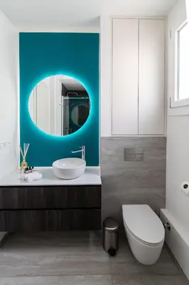 a bathroom with a toilet and a sink and a mirror at Oasis Azur 1 min from the beach in Nice