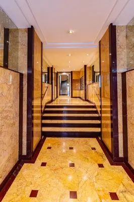 a lobby of a building with a staircase at Oasis Azur 1 min from the beach in Nice