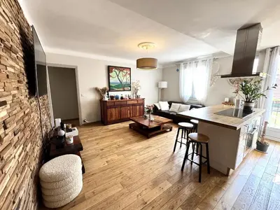 a living room with a kitchen and a living room with a table at BB OT Petit Balcon De La Providence - Old Town in Nice