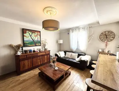 a living room with a couch and a table at BB OT Petit Balcon De La Providence - Old Town in Nice