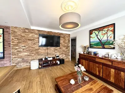 a living room with a brick wall at BB OT Petit Balcon De La Providence - Old Town in Nice