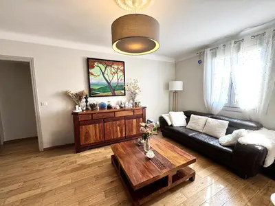 a living room with a couch and a coffee table at BB OT Petit Balcon De La Providence - Old Town in Nice