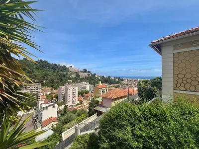a view of a city from a building at Appartement terrasse jacuzzi in Nice