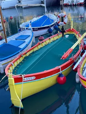 a yellow boat with a inflatable pool in the water at Mer à 5 minutes et vue splendide! in Nice