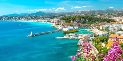 a view of a harbor with a boat in the water at Appartement confort au cœur de Nice in Nice