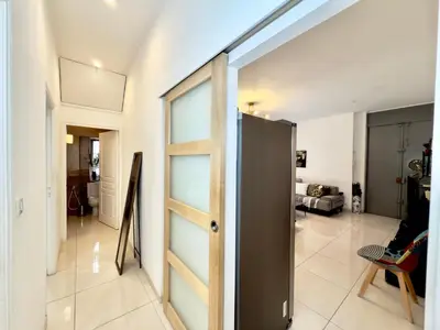 a sliding glass door in a room with a living room at Ze Perfect Place - Centre - Durandy - 2 Chb - AC in Nice