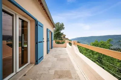 a walkway leading to a house with a view at La Quiétude - Spacious - Magnificent mountain view - AC - Jacuzzi in Aspremont