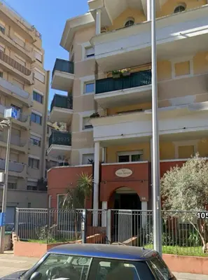 a car parked in front of a building at Studio magnan grand balcon in Nice
