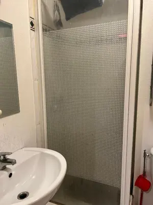 a bathroom with a shower and a sink at Studio magnan grand balcon in Nice
