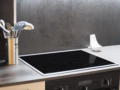 a kitchen counter with a stove top in a kitchen at Nice Centre - Apartment with balcony and stunning sea view! in Nice