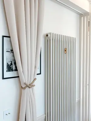 a radiator in a room next to a window at Azur Verdun in Nice