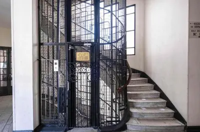 an entrance to a building with a wrought iron gate at Plein centre clim, proche gare et tramway in Nice