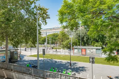 a park with bikes parked in front of a building at Nice Renting - CROTTI - Authentic Immersion Sea & Beach Massena in Nice