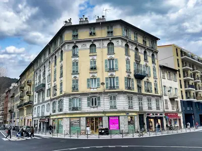 a large building on the corner of a street at Nissa la bella in Nice