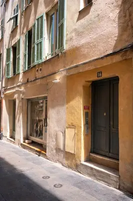 a building with the number on the side of a street at Vieux Nice Design & confort Mer à 2 min in Nice
