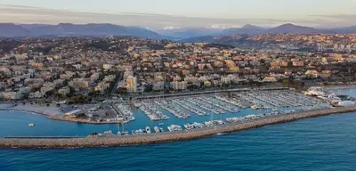 an aerial view of a harbor with boats in the water at Seaside View Saint-Laurent in Saint-Laurent-du-Var