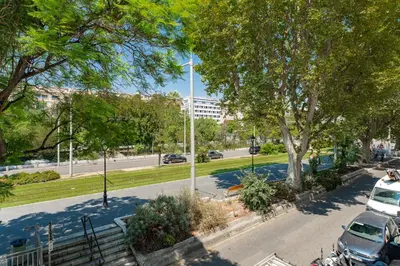 a view of a street with cars parked in a park at Nice Renting - CROTTIb - Studio Rare Pearl Typical Chic Massena & Sea in Nice