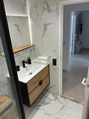a bathroom with a sink and a mirror at Nice vauban in Nice