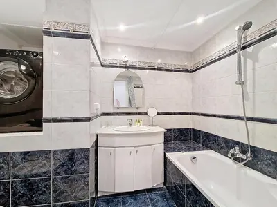 a bathroom with a sink and a tub and a shower at Nestor&Jeeves - PROMENADE DU SUD - Vue Mer in Nice