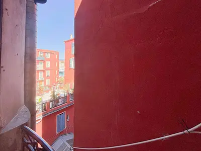a bedroom with a large white bed in a room at Stalingrad - Wifi, AC, 4pers in Nice