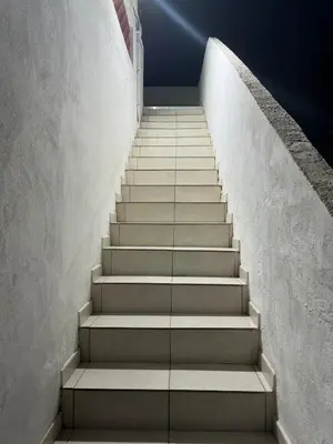 a stairway leading up to a building at Appartement spacieux proche mer idéalement situé in Cagnes-sur-Mer