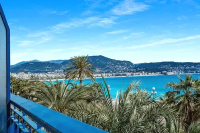 a view of the ocean from a balcony at Amazing Sunset in Nice