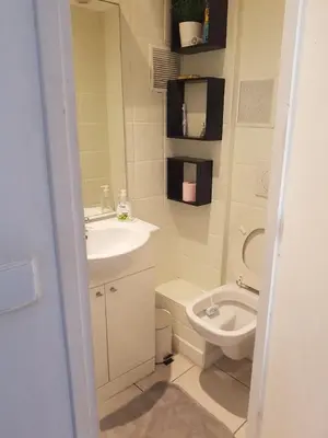 a bathroom with a sink and a toilet at Charmant studio Nice in Nice