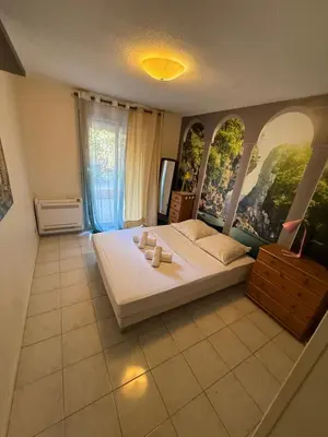 a view of a living room from the hallway at Cosy appartement, terrasse in Nice