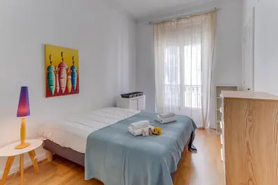 a bedroom with a bed with two towels on it at LE CONCORDIA AP4478 by RIVIERA HOLIDAY HOMES in Nice