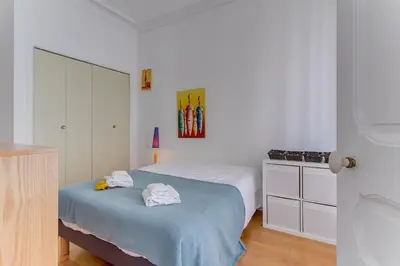 a bedroom with a bed with towels on it at LE CONCORDIA AP4478 by RIVIERA HOLIDAY HOMES in Nice