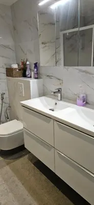 a white bathroom with a sink and a toilet at Villa Nanou Riviera in Nice