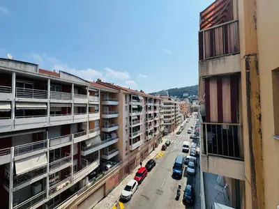 an overhead view of a city street with parked cars at Beautiful 2 bedroom apartment Port - 5 min to beaches in Nice