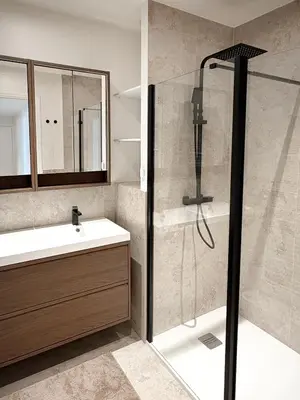 a bathroom with a shower and a sink at Nice Center - Spacious Luxury Apartment with Air Conditioning in Nice