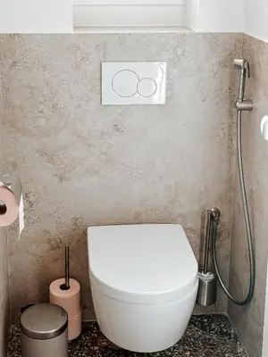 a bathroom with a white toilet and a shower at Nice Center - Spacious Luxury Apartment with Air Conditioning in Nice