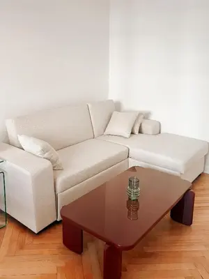 a white couch and a coffee table in a living room at Nice Center - Spacious Luxury Apartment with Air Conditioning in Nice