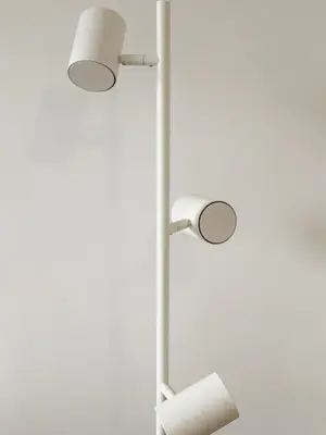 a white lamp with two lights on a wall at Nice Center - Spacious Luxury Apartment with Air Conditioning in Nice
