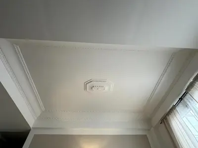 a white coffered ceiling with a smoke detector on it at Carré d'Or - 2P Cosy avec Terrasse et véranda in Nice