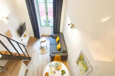 an overhead view of a living room with a couch at Duplex cosy dans la Vieille Ville in Nice