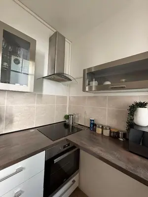 a kitchen with a sink and a counter top at Studio proche gare in Nice