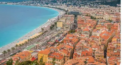 a living room with a couch and a table at Beautiful apartament 2 pièce Nice center in Nice