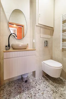 a bathroom with a sink and a mirror at 44 LAMARTINE - Charmant 2 pieces - Centre-ville in Nice