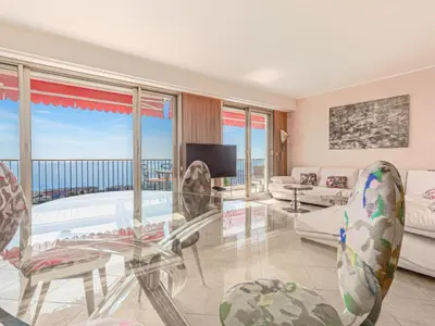 a living room with a view of the ocean at Apartment Le Sirius by Interhome in Nice