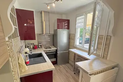 a small kitchen with a sink and a refrigerator at Cosy one bedroom apartment to Nice in Nice